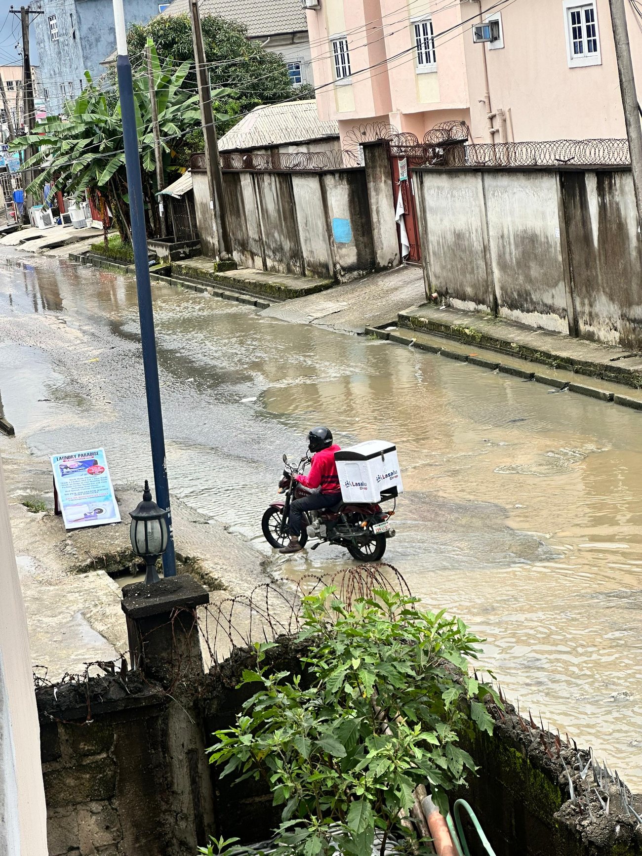 A Lasalu Drop rider on the streets of Port Harcourt
